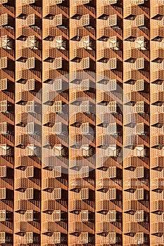 Vertical Shot of a Rusty Metal Design of a Building`s Exterior