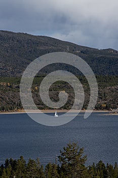 Vertical shot of a sailing boat at Dillon Reservoir