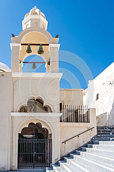 Vertical shot of Saint Spyridon Emporeio Holy Orthodox Church. Santorini, Greece.