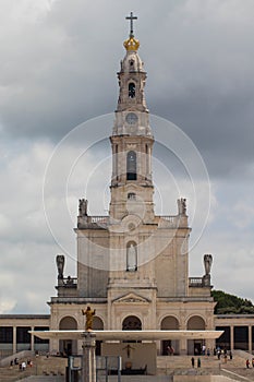 Vertical shot of Sanctuary of Fatima, Portugal against the cloudy sky