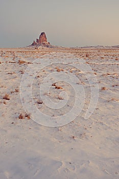 Vertical shot of sandstone formations of Navajo Nation\'s Monument Valley Park in Arizona, US