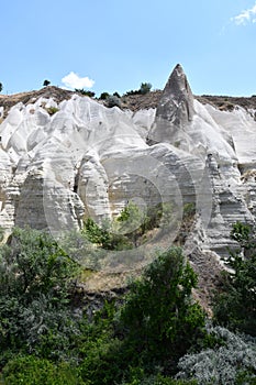 Vertical shot of the sandstone rock formations near Love Valley in Cappadocia, Turkey