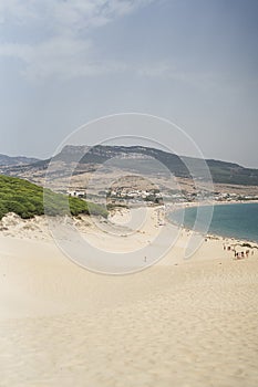 Vertical shot of the sandy beach of the Estrecho Natural Park, Tarifa, Spain photo