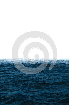 Vertical shot of sea waves and clear sky calm ocean water surface