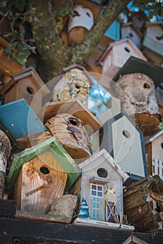 Vertical shot of a set of cute birdhouses