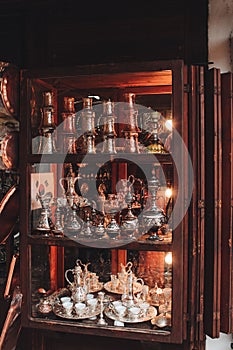 Vertical shot of showcasing of handcraft pitchers and small glasses in Bascarscija Sarajevo