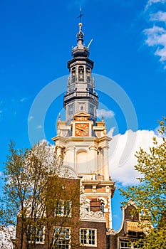 Vertical shot of South Church in Amsterdam, Netherlands under a blue sky