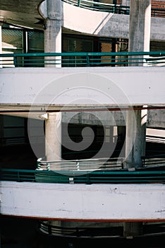 Vertical shot of a spiral ramp in a concrete parking garage