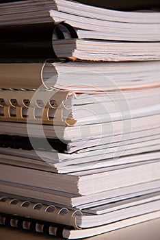 Vertical shot of a stack of documents