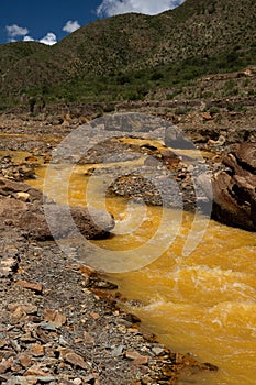 Vertical shot of the Sucio River with mountains in the background. Costa Rica. photo