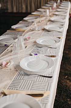 Vertical shot of table setting at a wedding venue