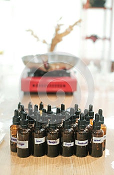 Vertical shot of a table at a workshop on making scented candles.