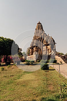 Vertical shot of a temple in the Khajuraho Group of Monuments in Chhatarpur district, India photo