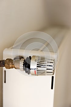 Vertical shot of the thermostat of heating radiator in an apartment