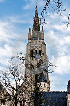 Vertical shot, of the tower of the church of our lady, Bruges