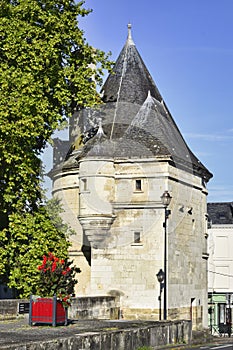 Vertical shot of the tower of the fortress bridge of Henry IV in Chatellerault