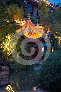 Vertical shot of a traditional Chinese building in the evening in Dongpo, Meishan city