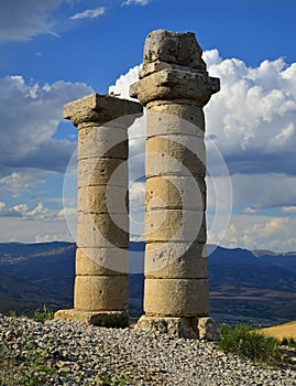 Vertical shot of two historical columns in Karakus Tumulus in Turkey