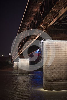 Vertical shot of under the Wuhan Changjiang River Bridge at night, vertical shot