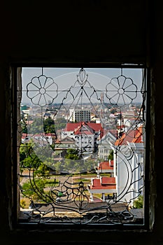 Vertical shot of a view from a decorative window in Laos