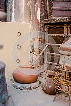 Vertical shot of a vintage clay pot in an old Buddhist building