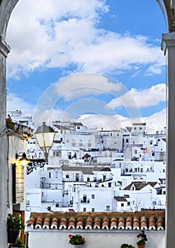 Vertical shot of white buildings in Vejer de la Frontera, Spain. photo