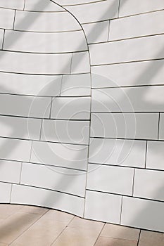 Vertical shot of white wall inside Louis Vuitton foundation building photo