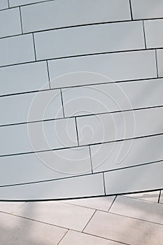 Vertical shot of white wall inside Louis Vuitton foundation building photo