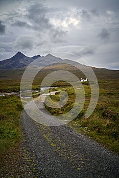 Vertical shot of a winding road through the highlands in Sligachan, Isle of Skye, Scotland