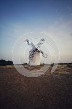 Vertical shot of a windmill in Campo de Criptana, Spain