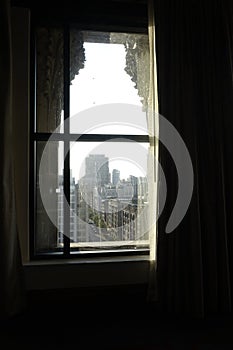 Vertical shot of a window view of city buildings in St. Louis, Missouri