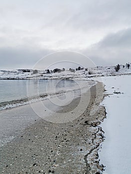 Vertical shot of the winter in the Arctic region, Hillesoy, Kvaloya Island, Tromso, Norway