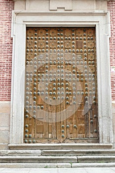 Vertical shot of a wooden door of the Cathedral of Toledo, Spain