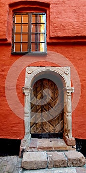 Vertical shot of a wooden door in an old house in Stockholm, Sweden