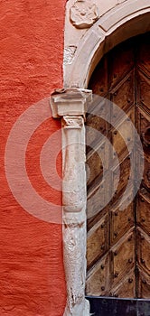 Vertical shot of a wooden door in an old house in Stockholm, Sweden