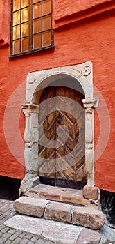 Vertical shot of a wooden door in an old house in Stockholm, Sweden