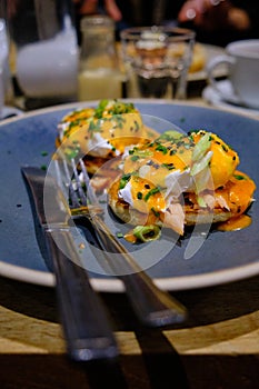 Vertical shpt of a plate of a seafood on a wooden table