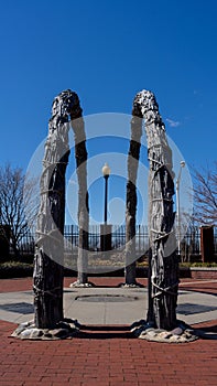 Vertical side view of wooden arches in South River walk park