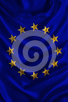 Vertical silk national flag of modern EU states with beautiful folds, concept of tourism, travel, emigration, global business