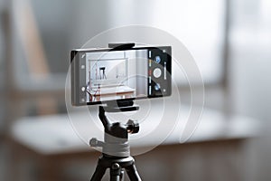 Vertical Smartphone Mockup on Tripod in Studio