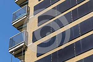 Vertical solar panels in detail, flat on walls of apartment