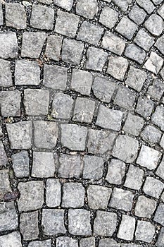 Vertical stone pattern gray marble background urban square of the old city