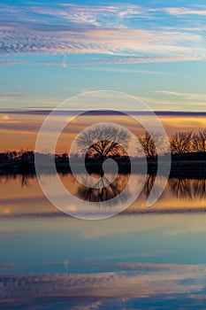 Vertical symmetry with beautiful sunset over lake