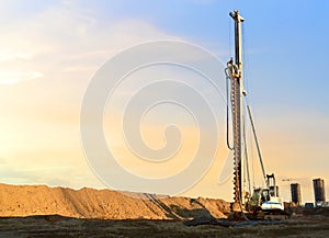 Vertical tamrock pile foundation drilling machine. Drill rig at construction site. Ground Improvement techniques, vibroflotation
