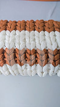 Vertical Texture of Brown and White Knitted Fabric Stripes Pattern