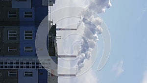 vertical Timelapse smoke from a chimney of a thermal power plant. Air pollution