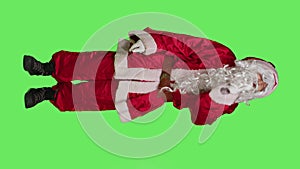 Vertical video Front view of saint nick showing hush symbol