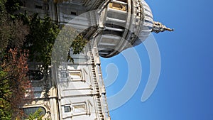 Vertical video of popular London tourist attraction and landmark of St Pauls Cathedral on a bright b