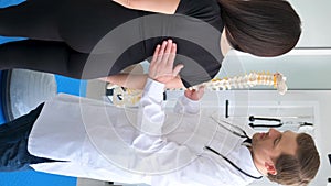 Vertical video, a vertebrologist is a doctor who deals with comprehensive treatment of the musculoskeletal system.
