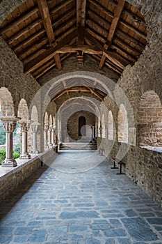 Arched corridor of the Romanesque Abbey of Saint Martin du Canigou photo
